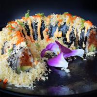 Volcano Roll · Spicy tuna, crab mix and avocado topped with crunch, masago, green onion, spicy mayo and eel...