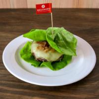 Keto Lettuce Wrapped Belcampo Burger · Lettuce Wrapped ½ LB Grass-Fed & Finished 28 Day Dry-Aged Belcampo Beef, White Cheddar, Cara...