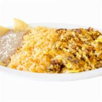 Huevo con Chorizo · Scrambled eggs mixed with Mexican cooked style pork sausage.