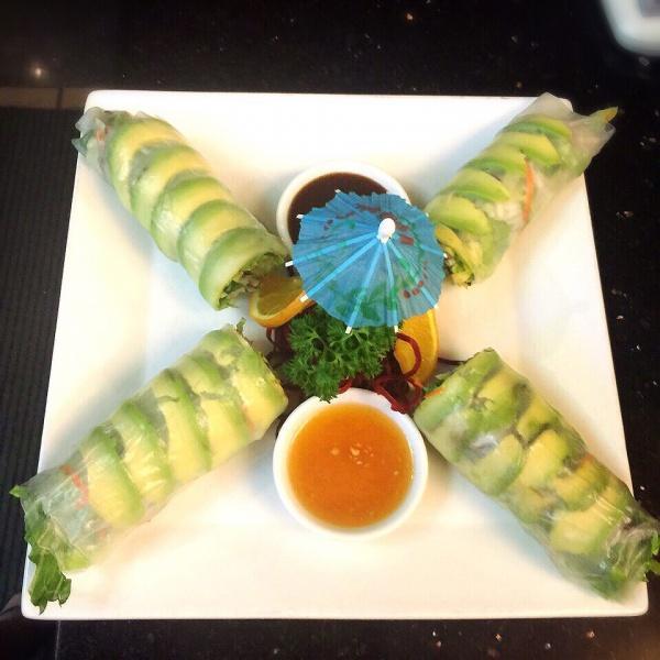 Avocado Fresh Spring Roll · 4 pieces. Fresh avocado, lettuce, mint, cilantro, bean sprouts, rice noodles in rice paper with house special sauces.