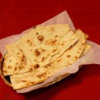 Cheese Naan · Naan stuffed with mozzarella cheese and baked in clay oven.