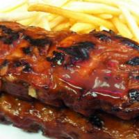 BBQ Baby Back Ribs 1/2 Slab · Slow cooked, fall off the bone served with homemade BBQ sauce, fries or baked potato, colesl...