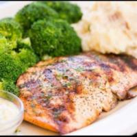 Fillet De Salmon · Fresh grilled salmon. Served with mashed potatoes and seasonal vegetables.