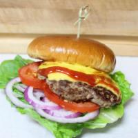 Dad's burger · 1/2 lb. patty with American cheese, ketchup, mustard, lettuce, tomato and raw onions.