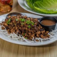 Chicken Lettuce Wraps · Minced chicken, mushrooms, scallions, and garlic and Asian slaw. Served with romaine lettuce...