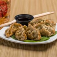 Vegetable Potstickers · Crispy or steamed dumplings filled with water chestnuts, carrots, vermicelli noodles, spinac...
