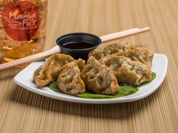 Vegetable Potstickers · Crispy or steamed dumplings filled with water chestnuts, carrots, vermicelli noodles, spinach, lemongrass and mushrooms. Served with citrus ponzu sauce.