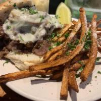 Shaved Steak Sandwich · 6 oz. shaved ribeye cooked in au ju with your choice of freshly cooked mushrooms, onions and...