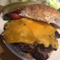 1/2 lb. Ground Beef Burger · Hand patted burger grilled your way with your choice of cheese and choice of our house works...