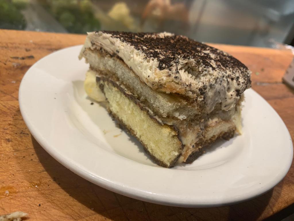 Homemade Tiramisu · Chocolate and coffee! Enjoy our homemade tiramisu made with espresso and kahlua, with a coffee and chelate dusting on the top.