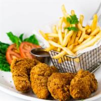 Chicken Strips · Sliced tender chicken breast dipped in our homemade batter, breaded and fried