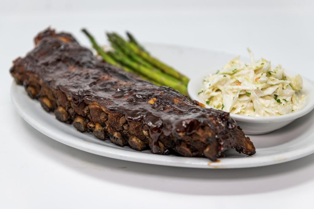 Baby Back Ribs · Signature fall off the bone ribs, brushed with BBQ sauce