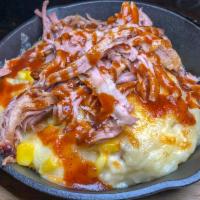 Butcher Bowl · Mashed potatoes, fresh corn and Jack cheese topped with choice of meat.