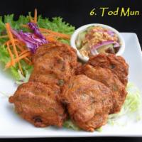 6. Six Piece Tod Mun Pla · Fish cake. Deep fired fish cakes served with cucumber salad.