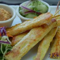 7. Six Pieces Kai Satay · Chicken satay. Grilled marinated chicken served with peanut sauce and cucumber salad.