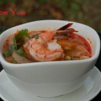 10. Tom Yum Soup · Spicy and sour soup with mushrooms, lemon grass, tomato, lime juice and cilantro.