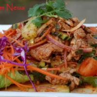 16. Yum Neua Salad · Beef, tomatoes, cucumbers, onions mixed with spicy lime sauce.