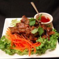 52. Moo Yang · Thai BBQ pork.
