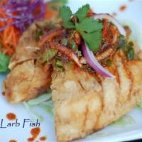 56. Larb Pla · Deep fried fish mixed with spicy lime juice and rice powders.