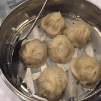12. Steamed Pork Shanghai Dumpling · 6 pieces.