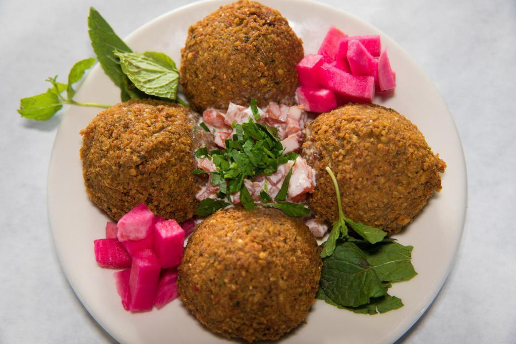 Falafel · 4 pcs. deep fried vegetarian patties made from chickpeas, fava beans, vegetables and spices. 