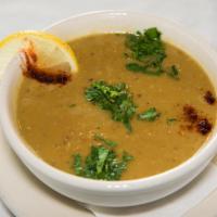 Lentil Soup · Pureed red lentils slow cooked with sauteed onions and perfect combination of spices. Vegeta...