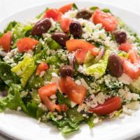 Greek Salad · Romaine lettuce, onions and Greek dressing topped with feta cheese and Kalamata olives with ...