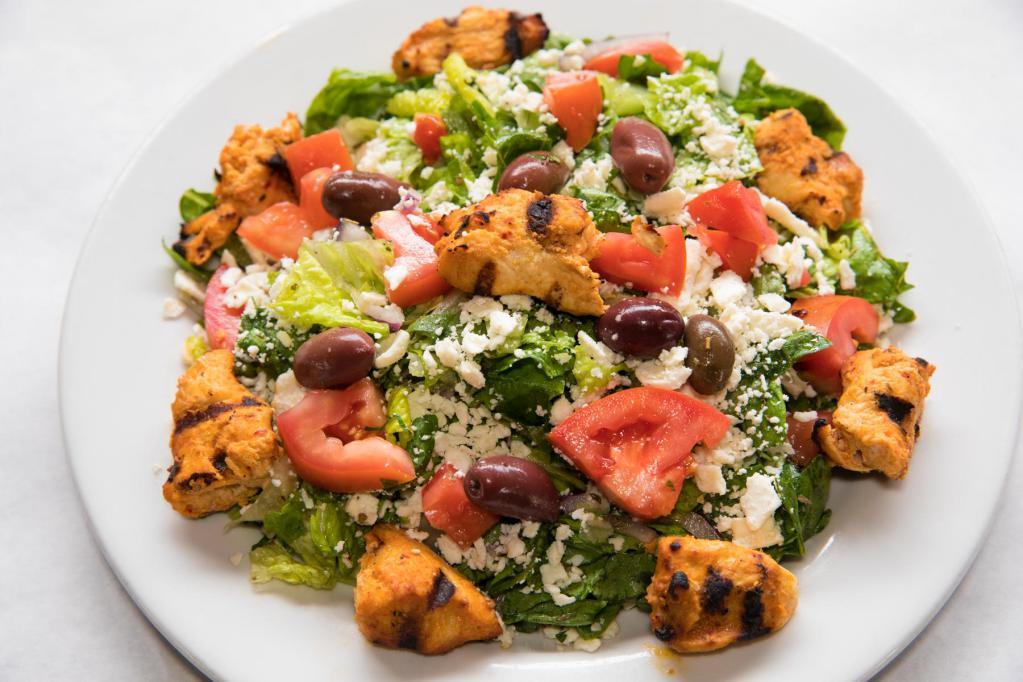 Judy's Salad · Grilled chicken kabob over our Greek salad. 