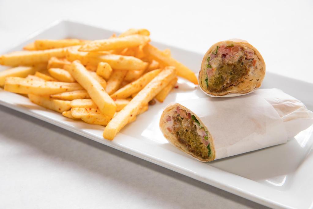 Falafel Pita · Falafel patties with tomatoes, onions, parsley and tahini sauce. Served with choice of side.