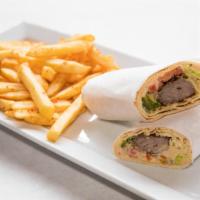 Beef Kabob Pita Wrap · Beef kabob with hummus, tomatoes, onions and parsley, served with its own distinctive dressi...