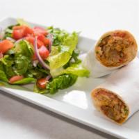 Chicken Shawarma Pita Wrap · Chicken shawarma with garlic sauce, tomatoes and parsley, served with its own distinctive dr...