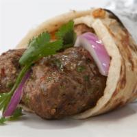 Beef Kabob Wrap · Wrapped with onions, cilantro and sumah.