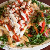 Chicken Shawarma Plate · Homemade white and red sauce, salad and pita bread. Served with choice of side and salad mix...