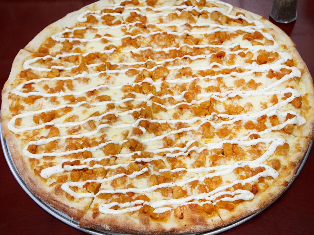 Buffalo Chicken Pizza · Homemade fried Buffalo chicken, mozzarella cheese with Ranch or Blue cheese dressings on the top.