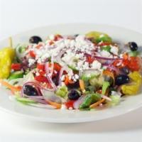 Greek Salad · Lettuce, onions, roasted bell peppers, tomatoes and cucumbers, topped with feta cheese, Gree...
