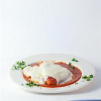 Chicken Parmigiana · Breaded and baked with mozzarella cheese and marinara sauce.