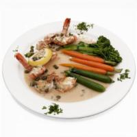 Gamberoni Scampi · Shrimp sauteed in garlic with lemon sauce and capers.