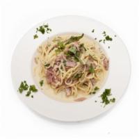 Pasta Carbonara · Prosciutto, egg, onion and pecorino Romano cheese.