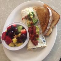 Narragansett Omelette · Grilled chicken, avocado, tomato and american cheese. Prepared with 3 large eggs and served ...