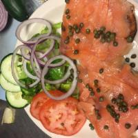 Lox Platter · Smoked salmon served on a bagel with lettuce, tomato, cucumbers, red onions and capers.