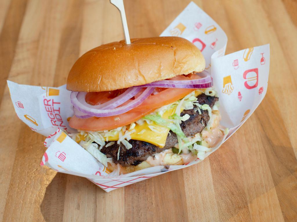 All-American Burger · American cheese, lettuce, tomato, pickles, red onion, and Bandit sauce.