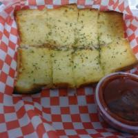 Garlic Bread (8 pc) · 8 pieces of our sub sandwich bread covered with our garlic butter blend and served with a ma...