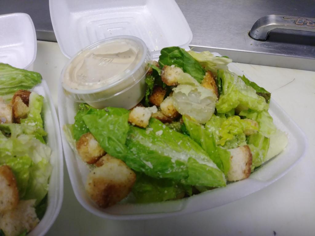 Caesar Salad · Romaine lettuce, croutons, parmesan cheese and choice of dressing.
