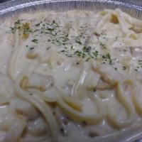 Chicken Fettuccine Alfredo · Pasta comes with side salad and garlic Knots