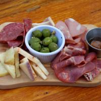 Meat and Cheese · Assorted cheese, cured meats, marinated olives.