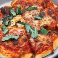 Margherita Pizza · Fresh tomato sauce, mozzarella, chopped tomato and basil.