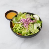 Classic Thai Salad · Choice of peanut dressing or honey ginger dressing with lettuce, red onion, tomatoes, cucumb...