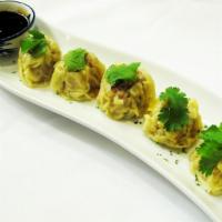 Shumai Pot Sticker (5 pcs) · Steamed dumplings made with a mix of shrimp and pork, served with black plum soy sauce.