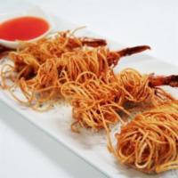 Shrimp Bang Bang (4 pcs) · Thai style marinated shrimp in crispy noodle wrap served sweet plum sauce.