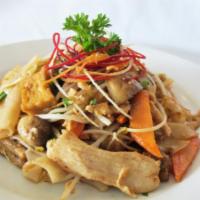 Messy Noodles · Stir-fried flat noodles, tofu, eggs, mushrooms, carrots, scallions, bean sprouts in brown se...